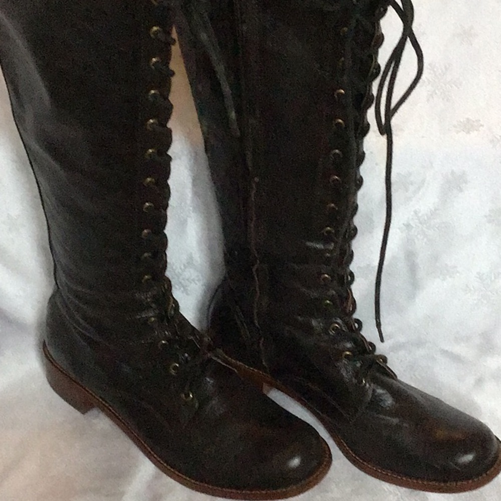Women’s below the knee, lace-up boots.